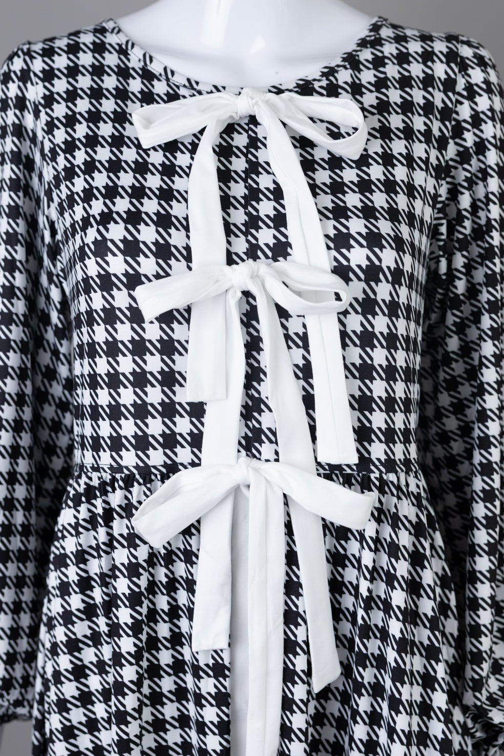 Model wearing Nuggles®  Addison Dress in Cookie Check