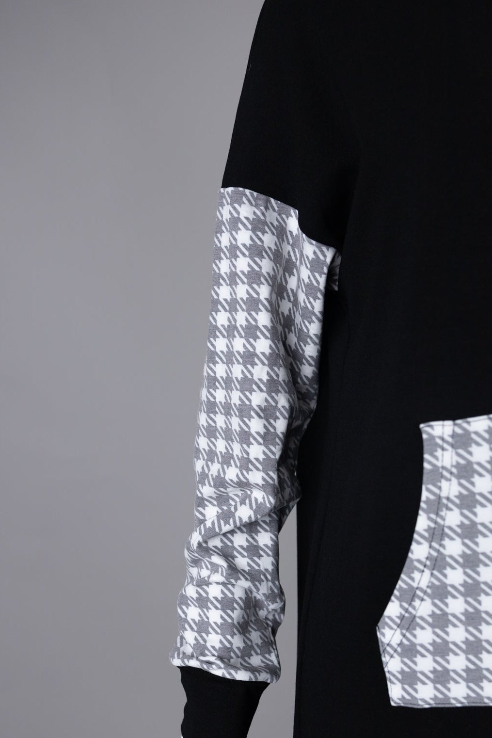 Model wearing Nuggles®  Hoodie Dress in Cookie Check