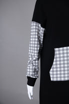 Model wearing Nuggles®  Hoodie Dress in Cookie Check
