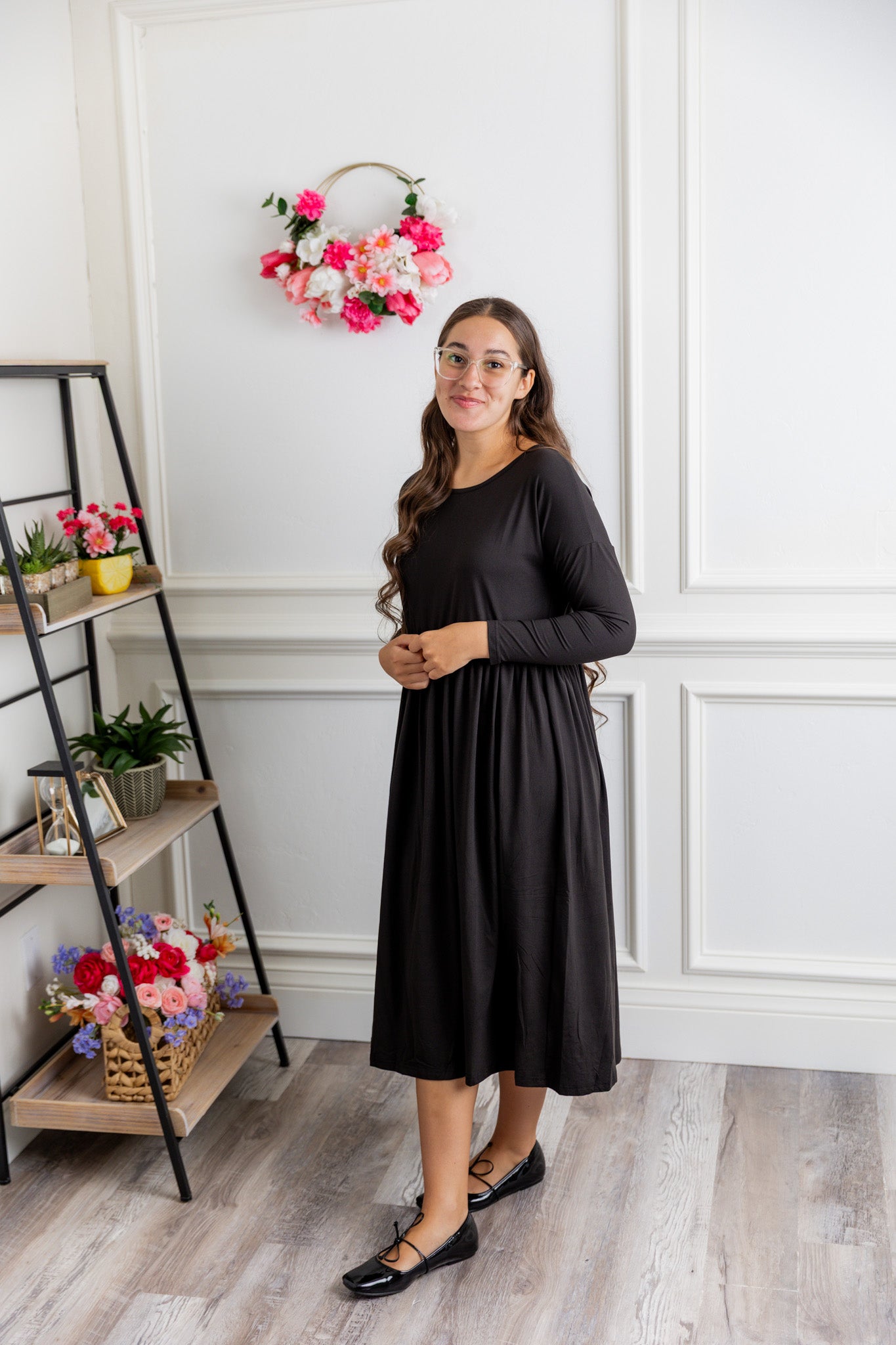 Nuggles® Farah Dress in solid color, modest long sleeve midi dress with empire waist, styled with flats for everyday wear.