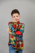 Model wearing Nuggles® Boy's Button Down Shirt in Patch Plaid