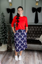 Model wearing Nuggles® 27 inch Sport Flex Skirt with pockets and drawstring waistband