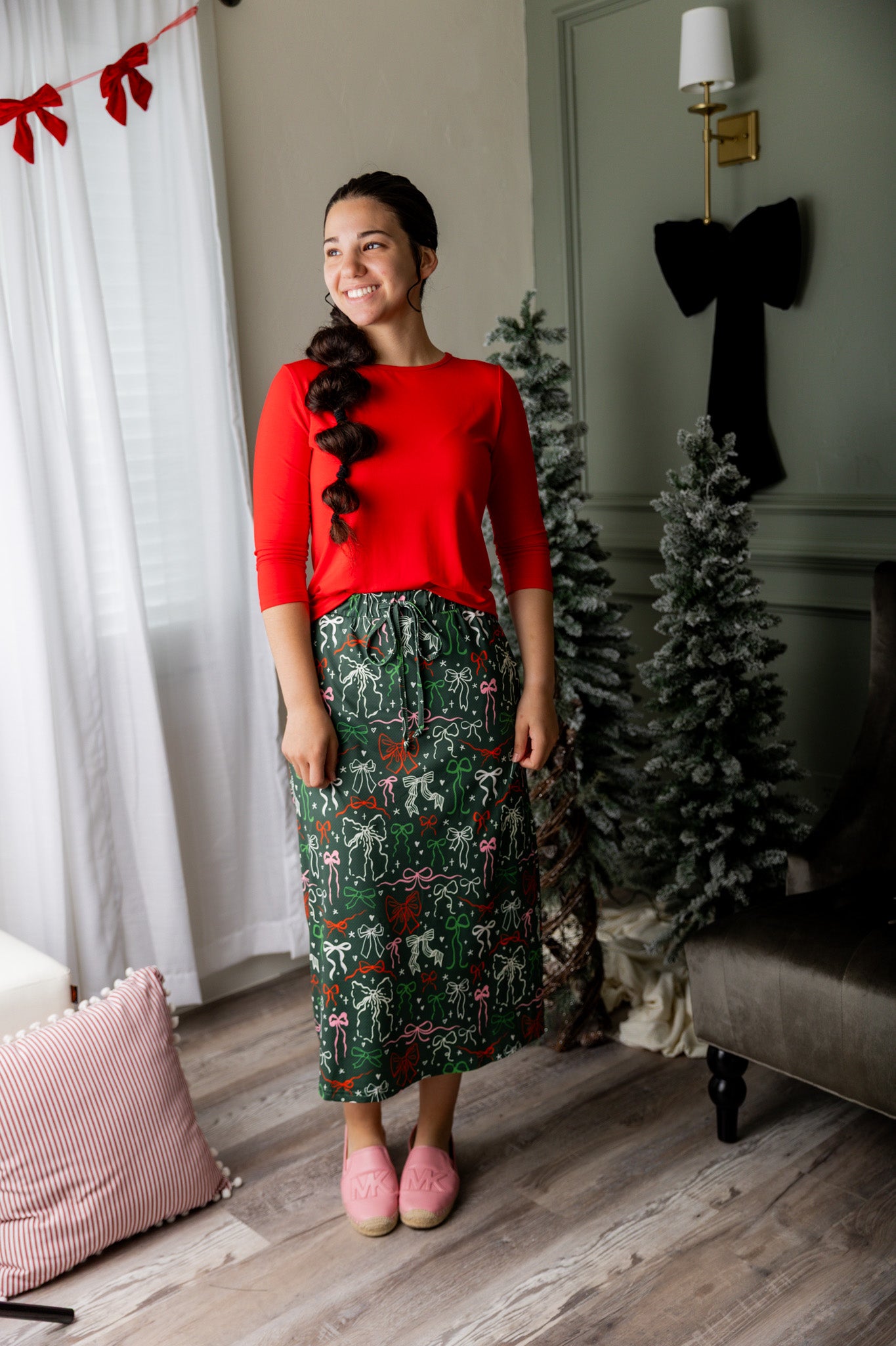Model wearing the Nuggles® 31 inch Sport Flex Skirt with adjustable waistband and pockets.