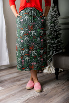 Model wearing the Nuggles® 31 inch Sport Flex Skirt with adjustable waistband and pockets.