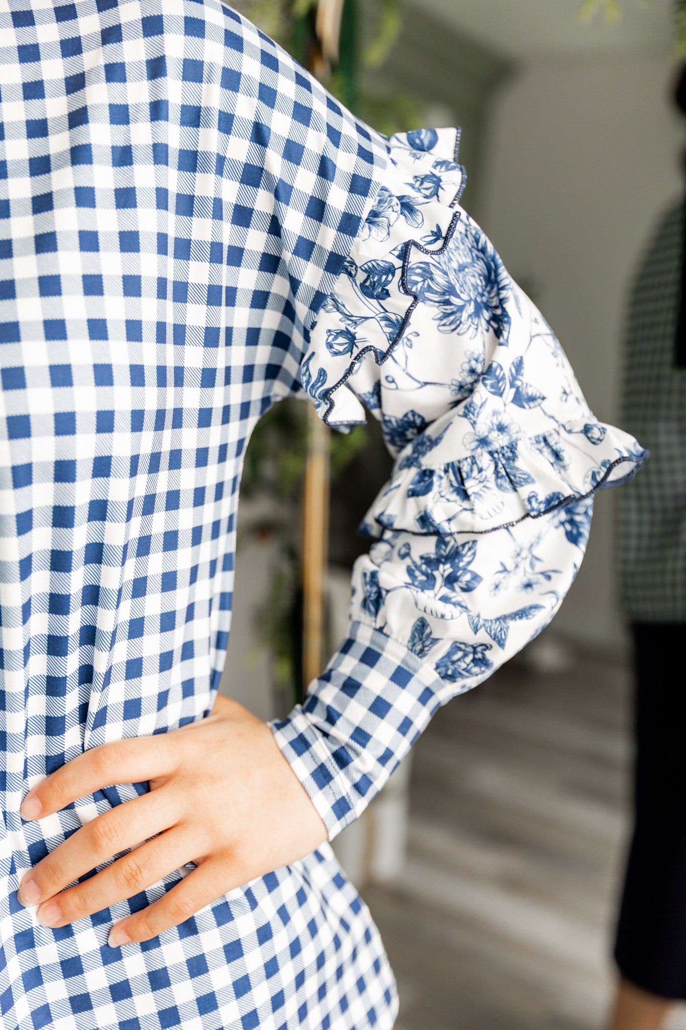 Nuggles® Rilynn Top – modest women’s printed top with ruffled sleeves and relaxed fit.