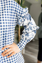 Nuggles® Rilynn Top – modest women’s printed top with ruffled sleeves and relaxed fit.