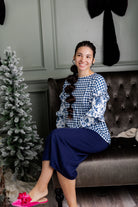 Nuggles® Rilynn Top – modest women’s printed top with ruffled sleeves and relaxed fit.