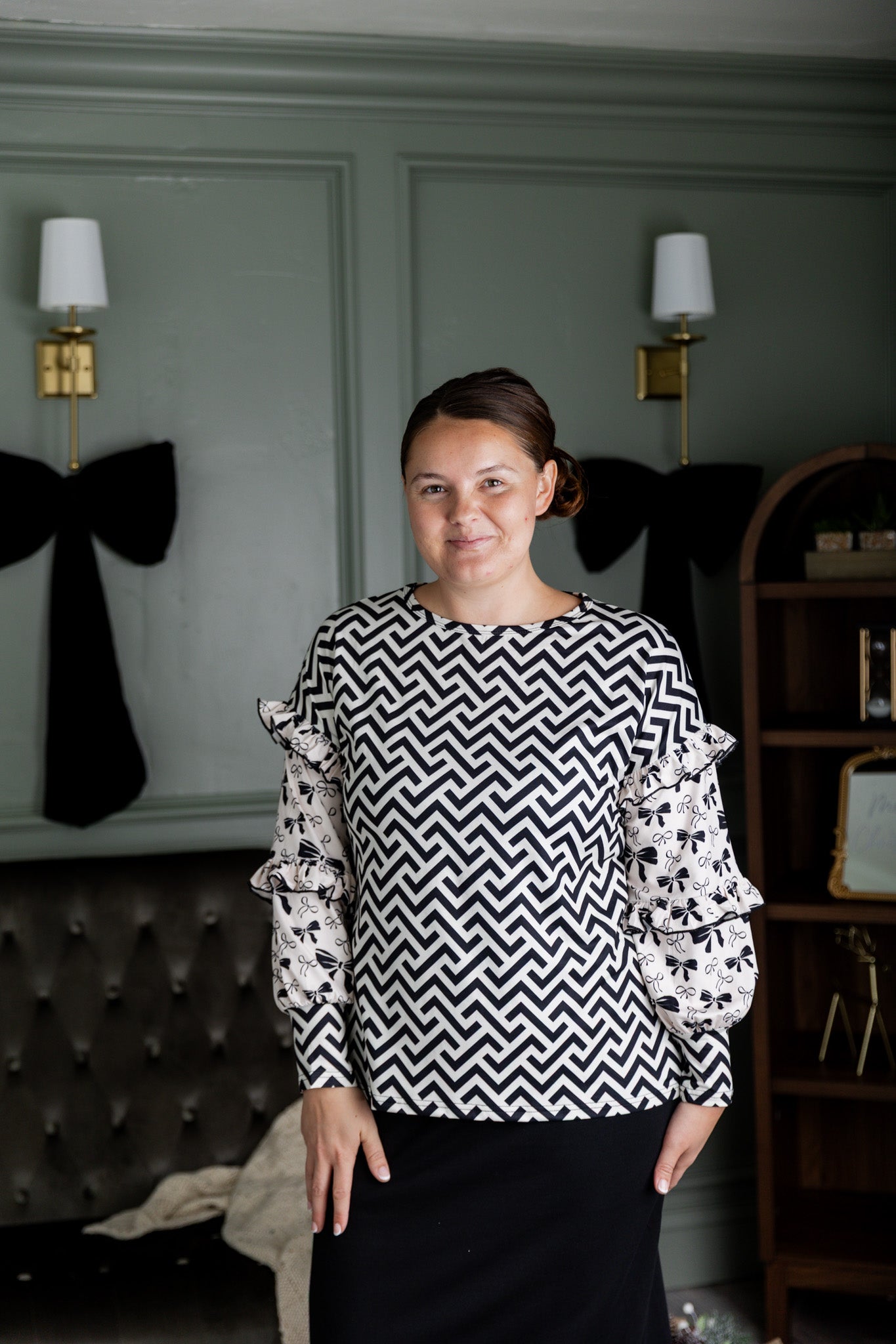 Nuggles® Rilynn Top – modest women’s printed top with ruffled sleeves and relaxed fit.