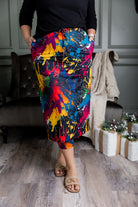 Model wearing the Nuggles® 31 inch Sport Flex Skirt with adjustable waistband and pockets.