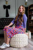 Model wearing Nuggles® 27 inch Sport Flex Skirt with pockets and drawstring waistband