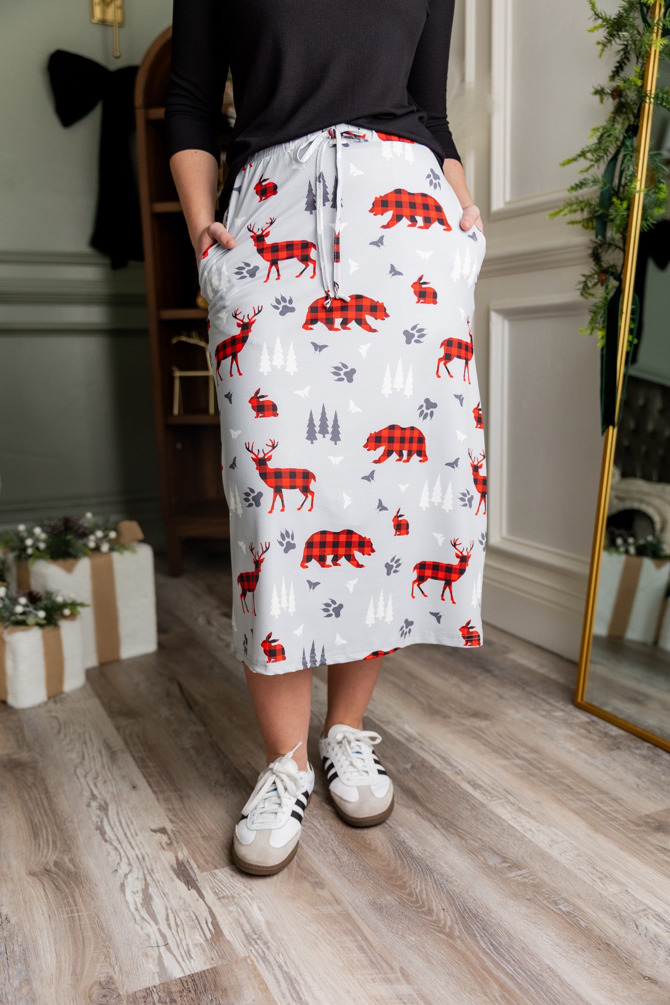 Model wearing the Nuggles® 31 inch Sport Flex Skirt with adjustable waistband and pockets.