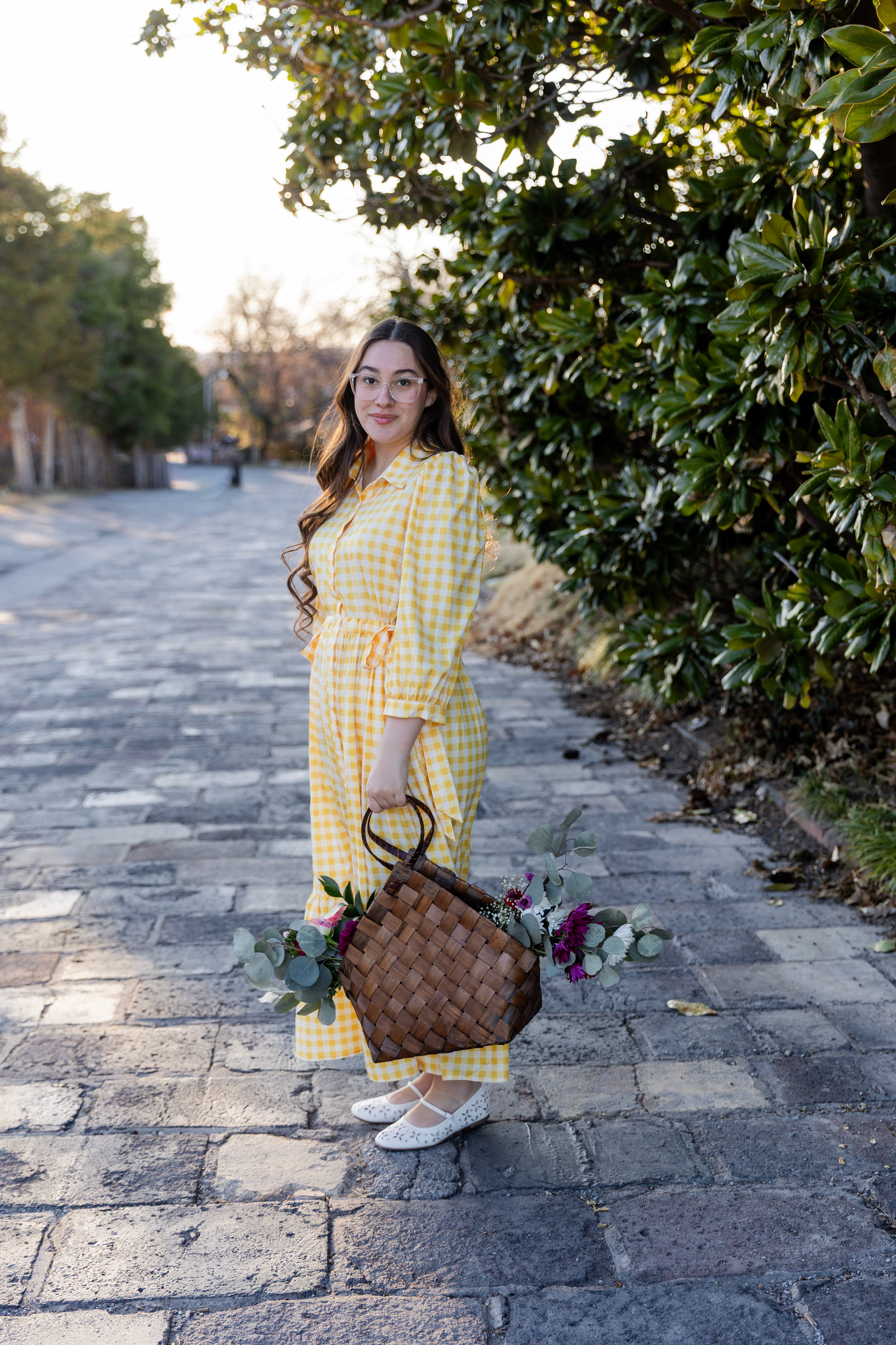 Model wearing the Nuggles® Leila Dress in Sunshine Check