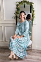 Modest high low knit dress with asymmetrical hem, ruffle sleeves, and mixed front prints – Kristine Dress by Nuggles®