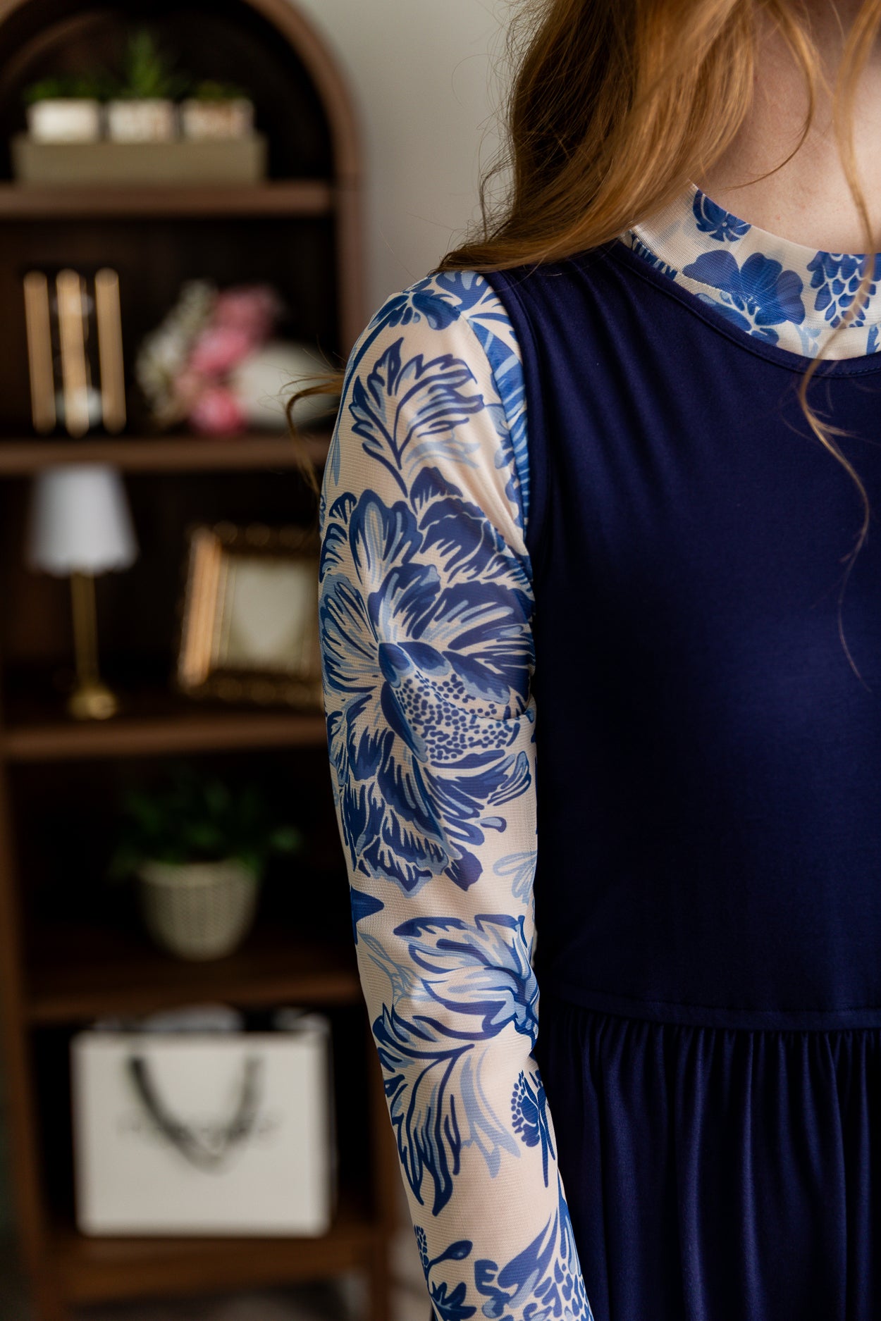 Model wearing Nuggles® Mesh Tee top in Confetti Bloom