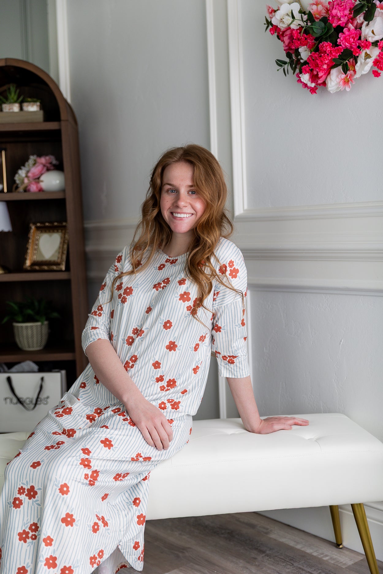 Model wearing Nuggles®  Heather Dress in Rosebud Pinstripe