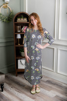 Model wearing Nuggles®  Heather Dress in Daisy Stripe