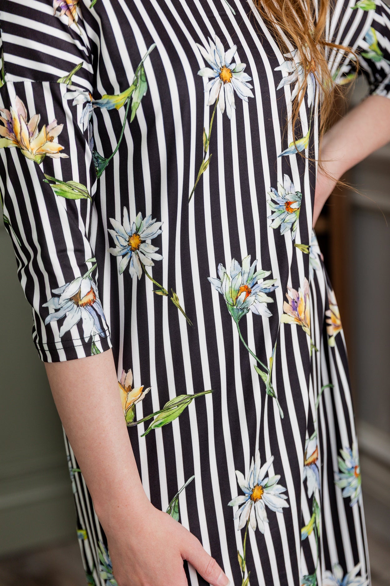 Model wearing Nuggles®  Heather Dress in Daisy Stripe