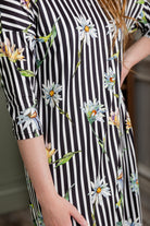 Model wearing Nuggles®  Heather Dress in Daisy Stripe