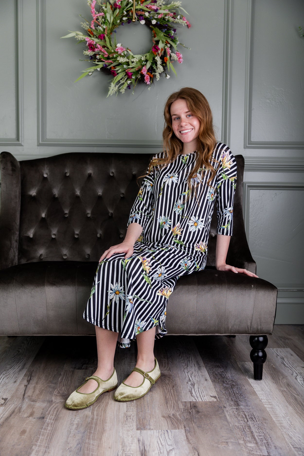 Model wearing Nuggles®  Heather Dress in Daisy Stripe