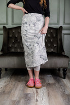 Model wearing Nuggles® 31" Sport Skirt in  Whispering Headlines