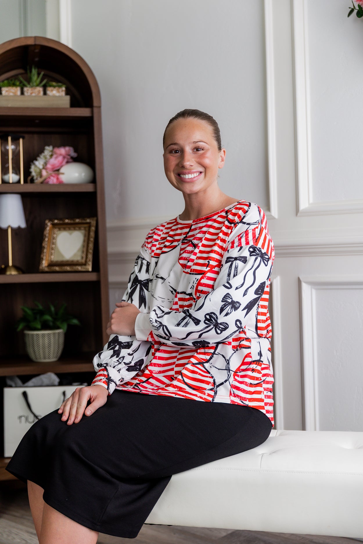 Model wearing the Nuggles® Bryauna Top in Boardwalk Bows