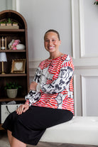 Model wearing the Nuggles® Bryauna Top in Boardwalk Bows