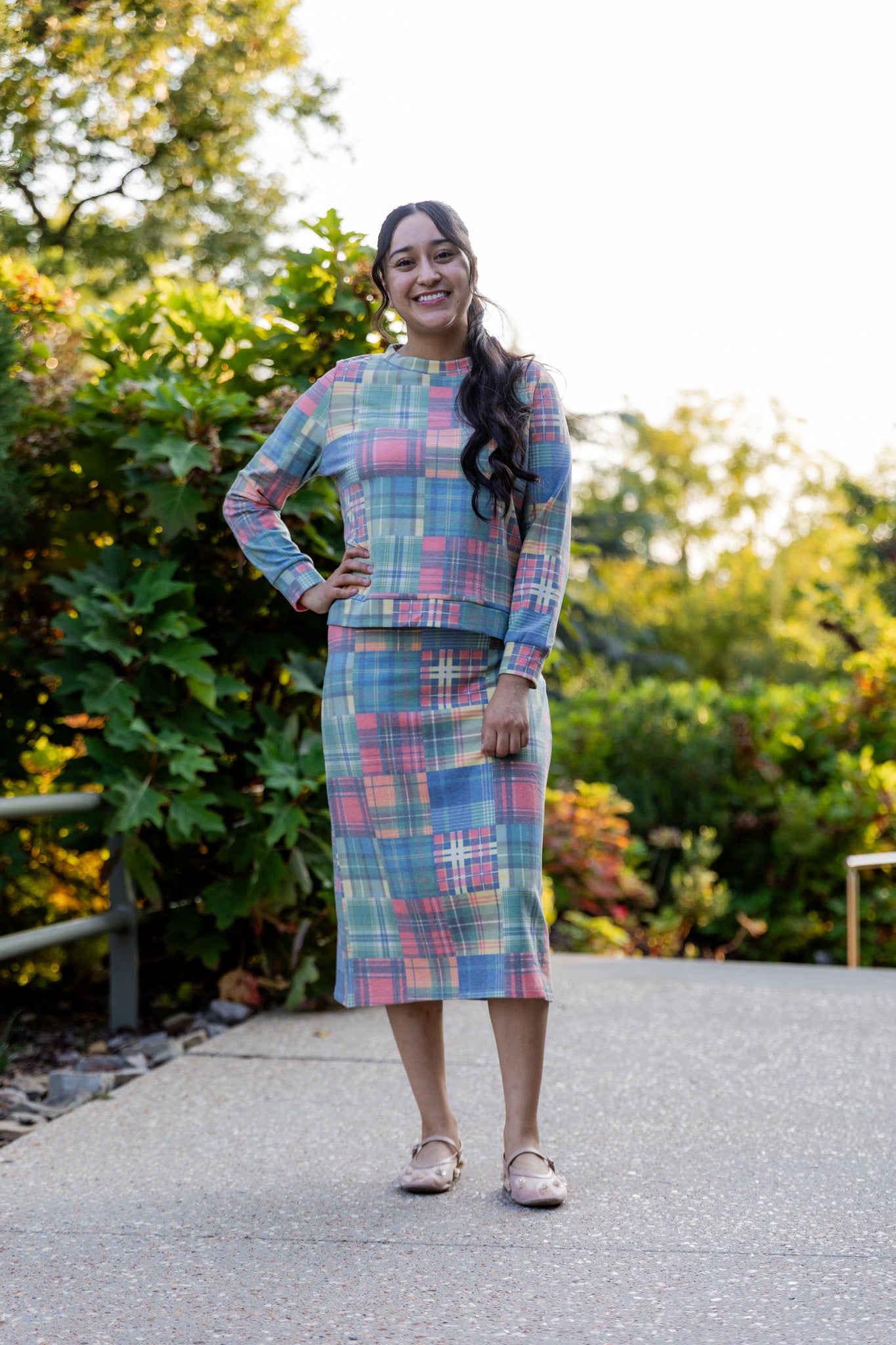 Nuggles® Iris two-piece set featuring soft knit midi skirt and crew-neck sweatshirt top