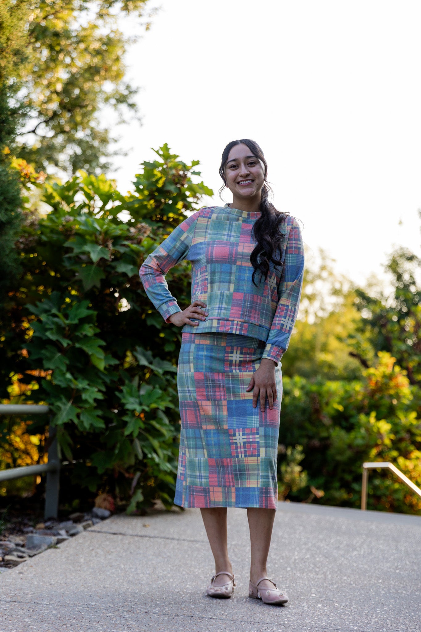 Nuggles® Iris two-piece set featuring soft knit midi skirt and crew-neck sweatshirt top