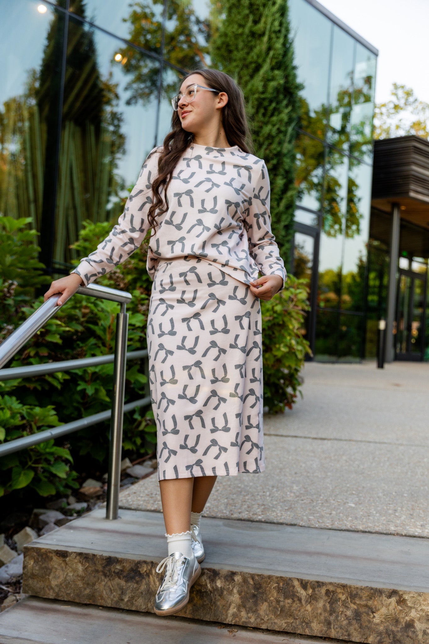 Nuggles® Iris two-piece set featuring soft knit midi skirt and crew-neck sweatshirt top