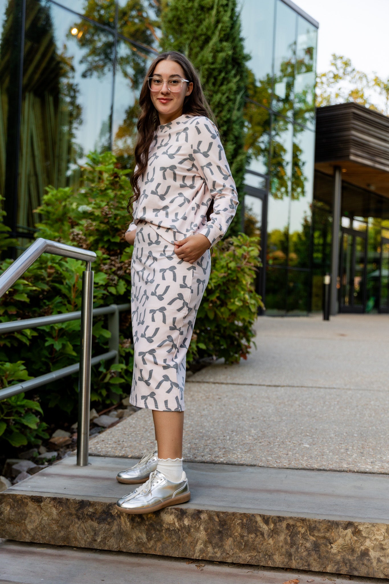 Nuggles® Iris two-piece set featuring soft knit midi skirt and crew-neck sweatshirt top