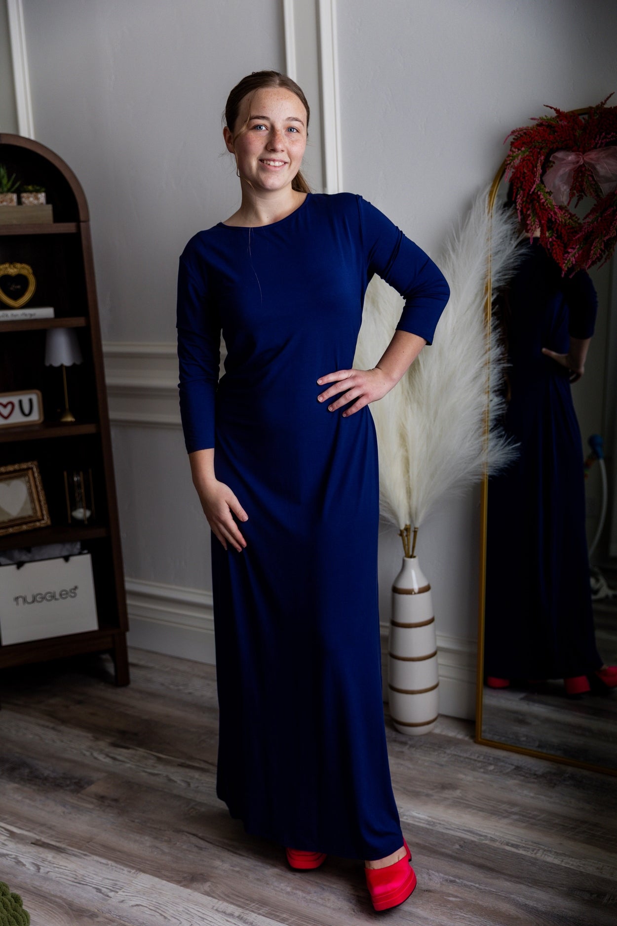 Model wearing Nuggles® Maxi Layering Dress in Dark Blue