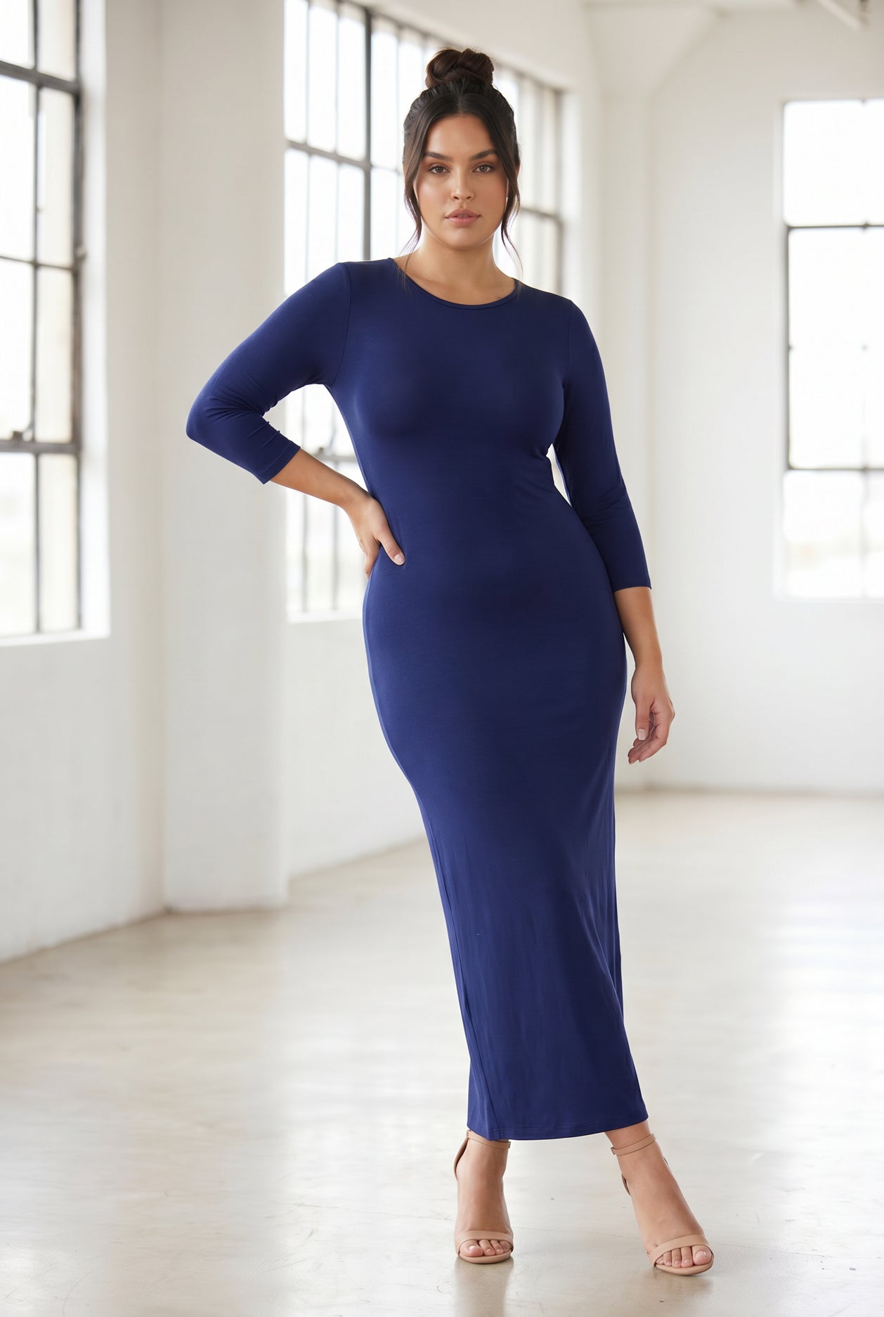 Model wearing Nuggles® Maxi Layering Dress in Dark Blue