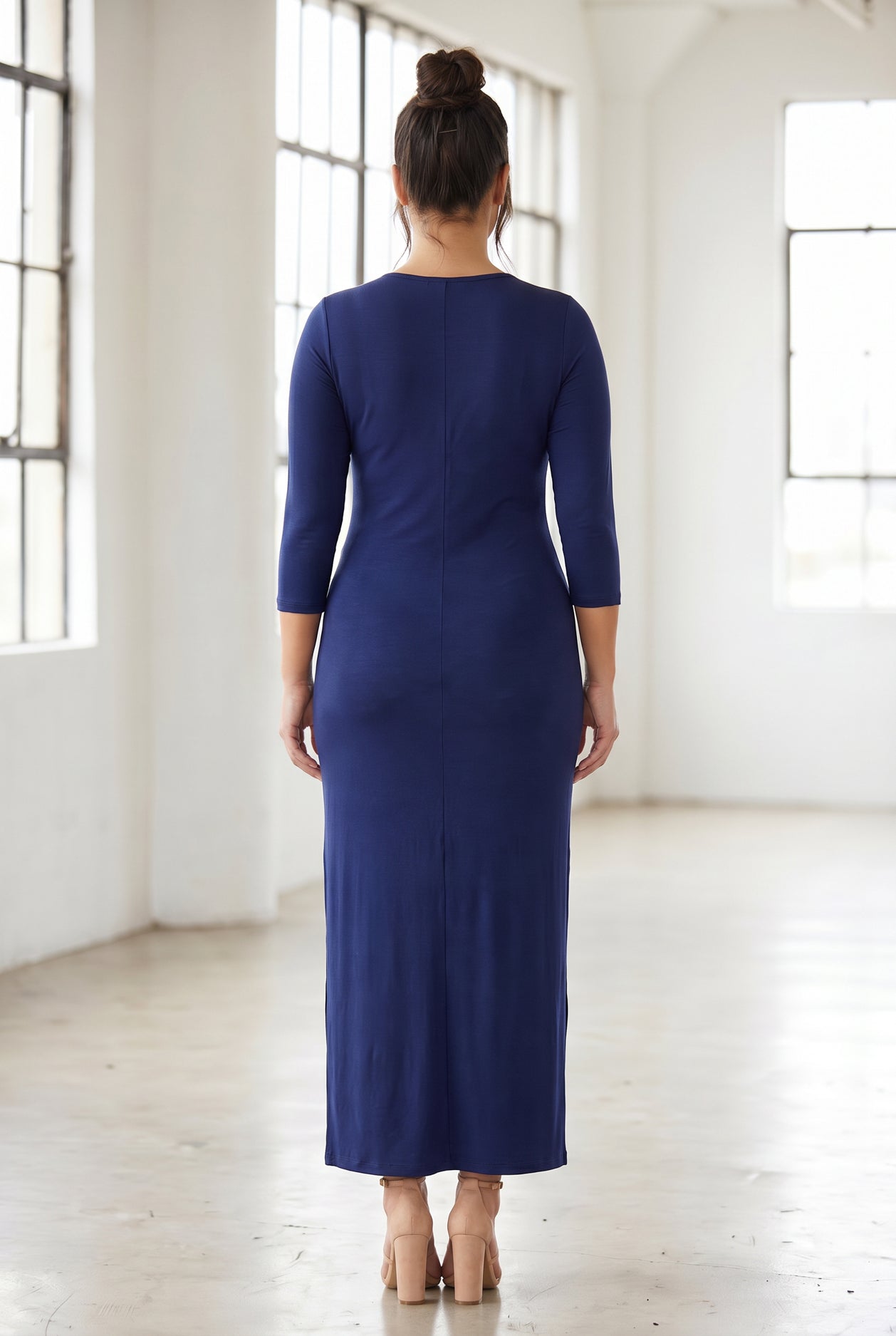 Model wearing Nuggles® Maxi Layering Dress in Dark Blue