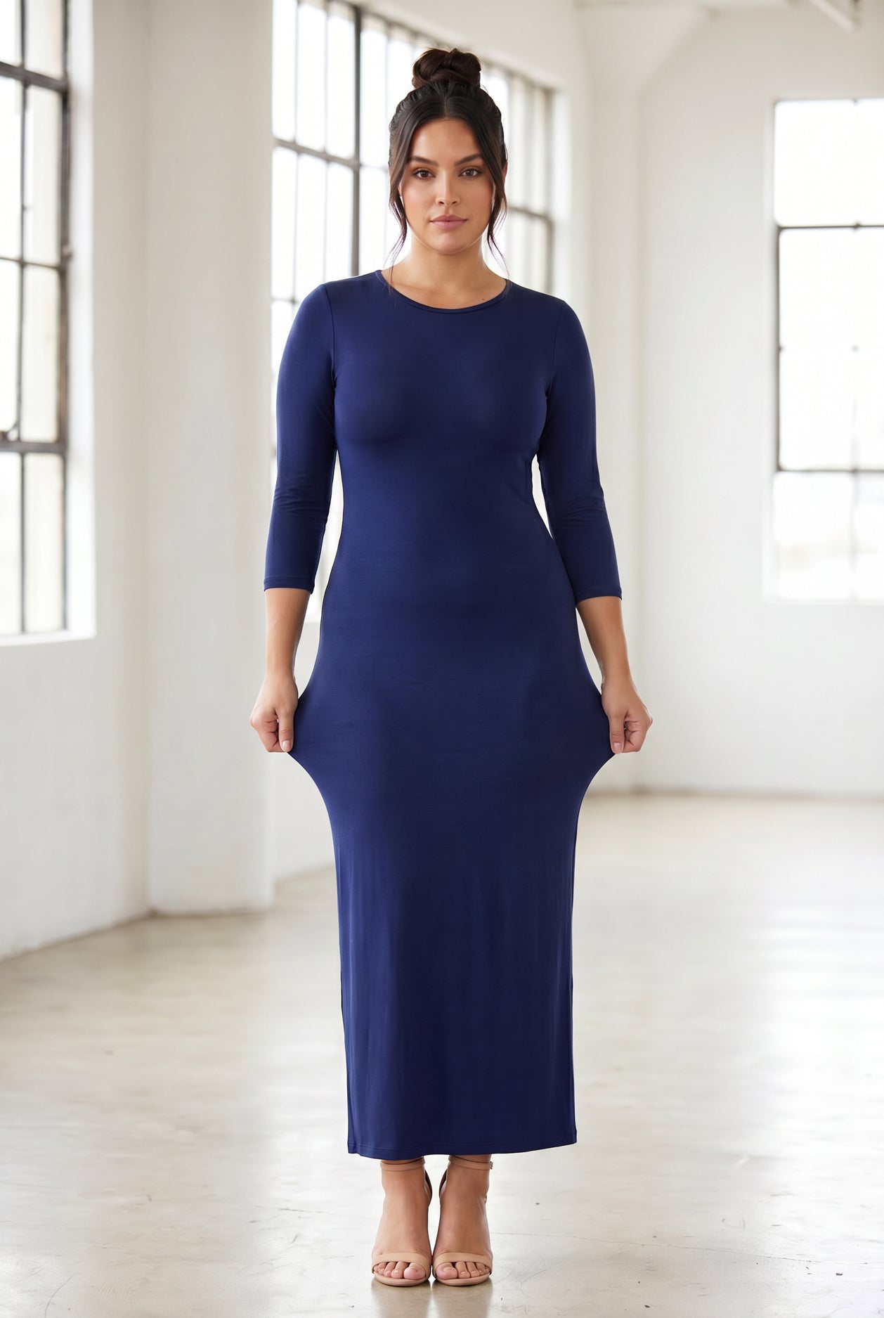 Model wearing Nuggles® Maxi Layering Dress in Dark Blue