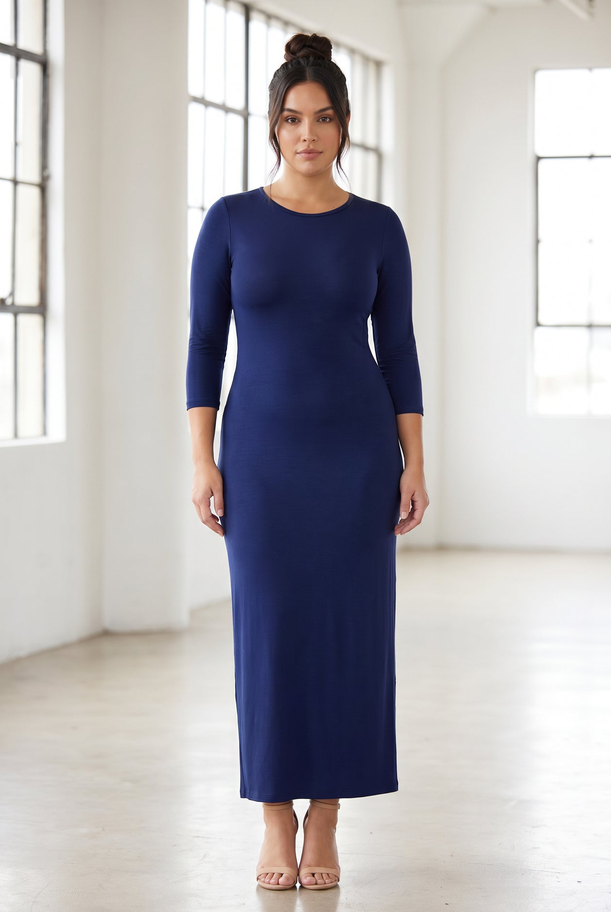 Model wearing Nuggles® Maxi Layering Dress in Dark Blue
