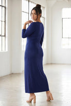 Model wearing Nuggles® Maxi Layering Dress in Dark Blue