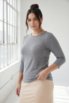 Model wearing Nuggles® 3/4 Essential Tee in Dark Heather
