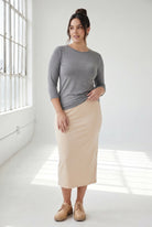 Model wearing Nuggles® 3/4 Essential Tee in Dark Heather