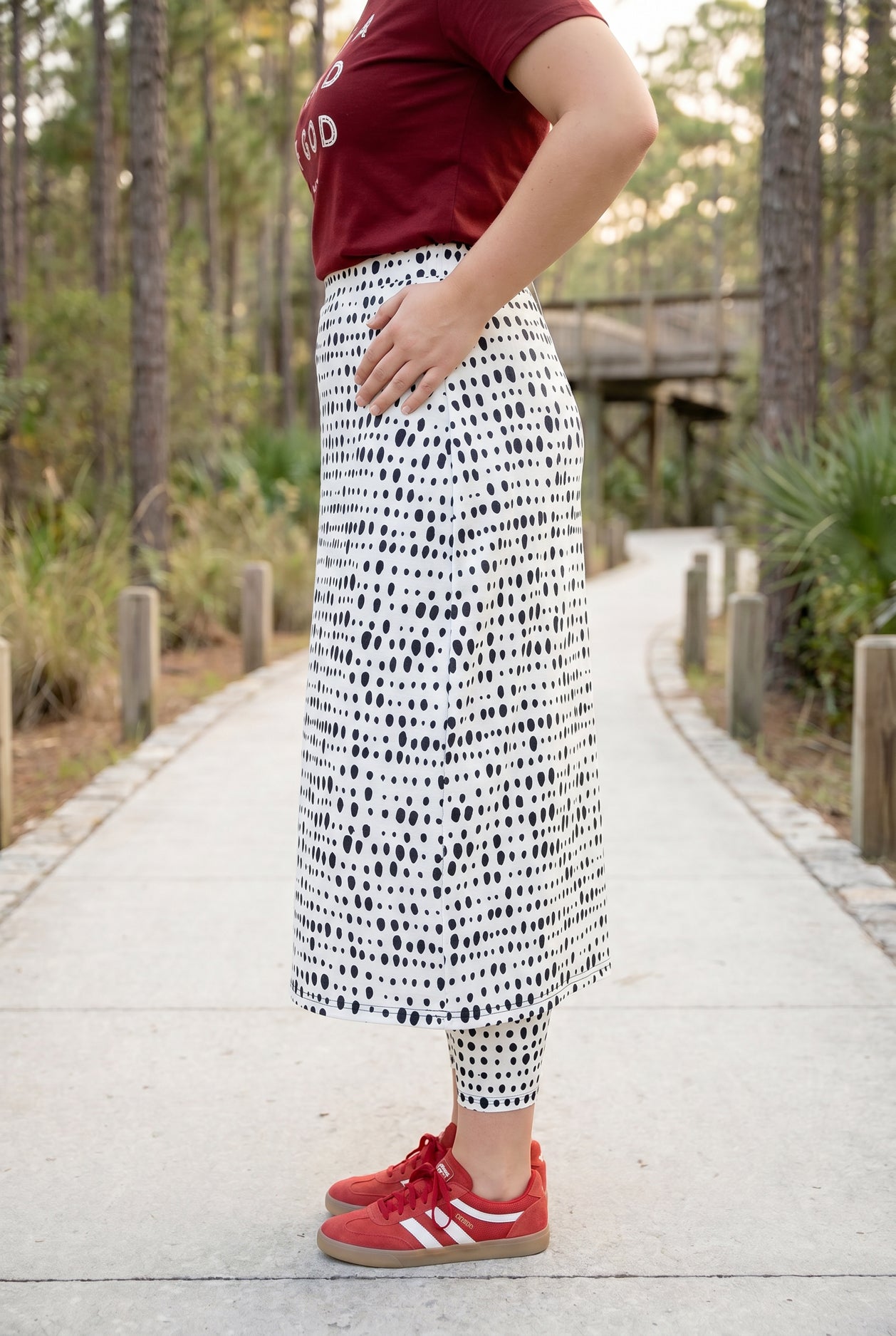Model wearing Nuggles® 31" All-Sport Skirt in Dash Print