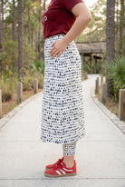 Model wearing Nuggles® 31" All-Sport Skirt in Dash Print