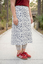 Model wearing Nuggles® 31" All-Sport Skirt in Dash Print