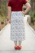 Model wearing Nuggles® 31" All-Sport Skirt in Dash Print