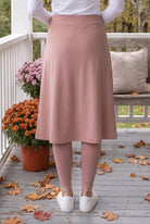 Model wearing Nuggles® Tilly Sport Skirt in Dusty Pink