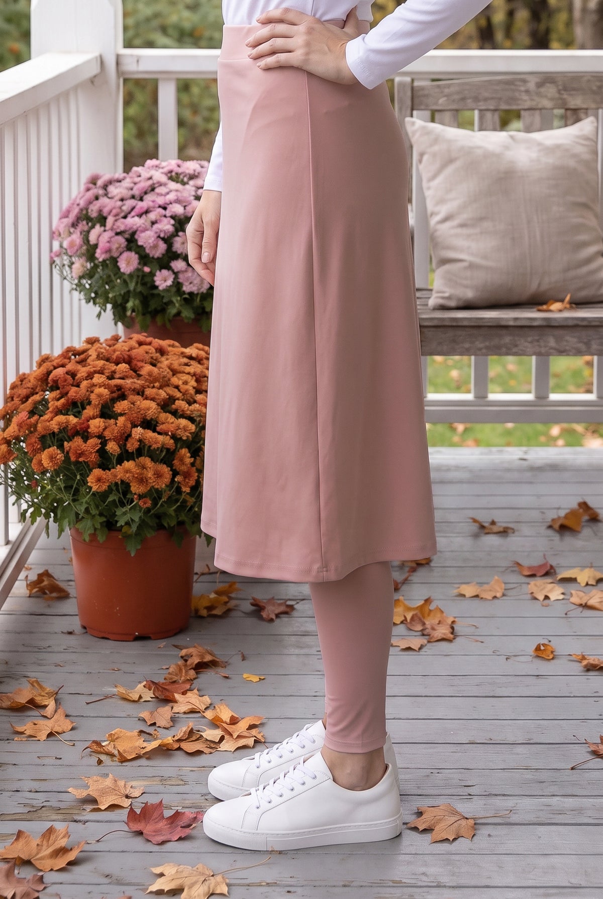 Model wearing Nuggles® Tilly Sport Skirt in Dusty Pink