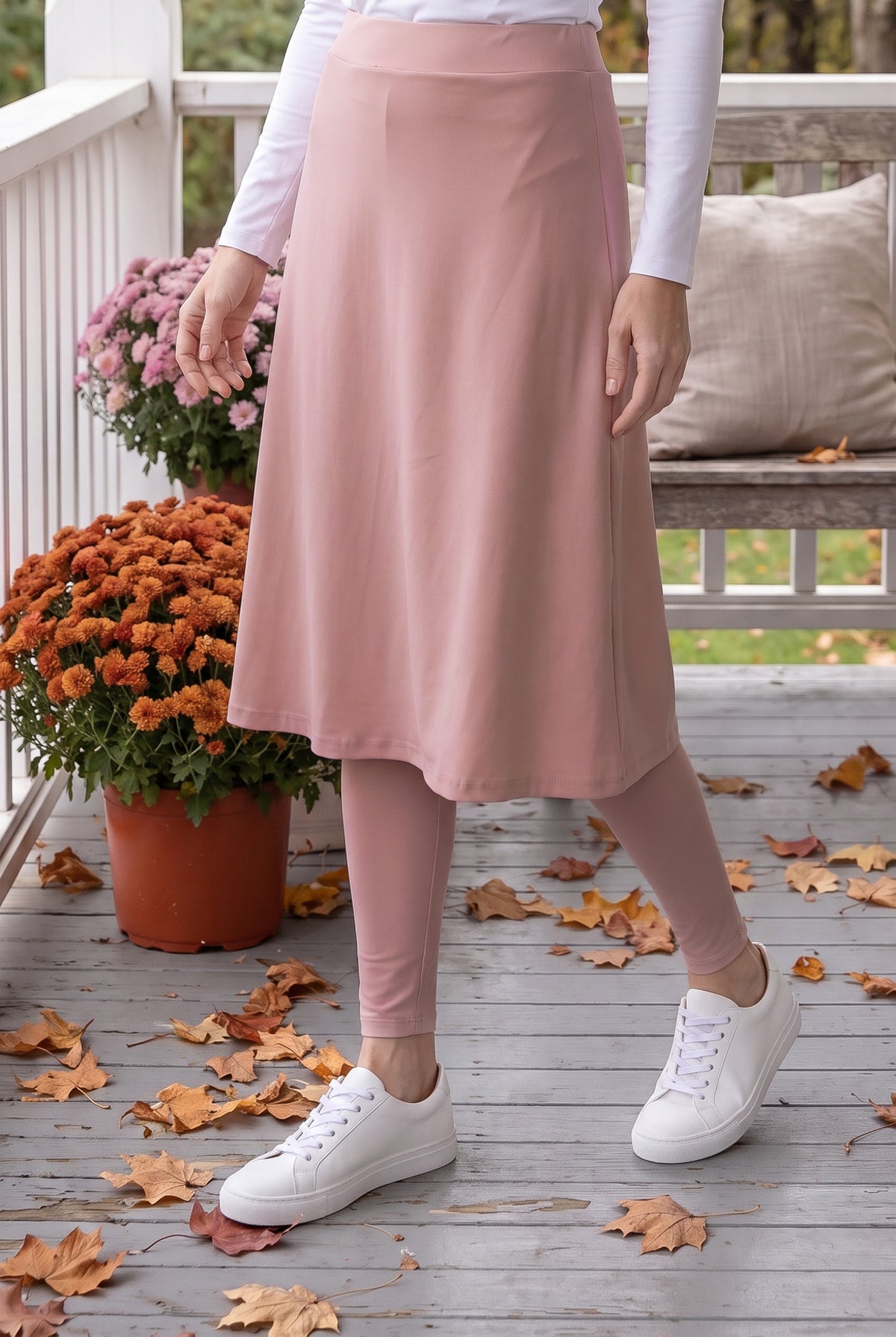 Model wearing Nuggles® Tilly Sport Skirt in Dusty Pink
