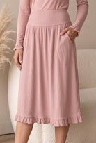 Model wearing Nuggles®  Bethany Shirt & Skirt in Dusty Pink