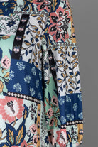 Nuggles® Patricia Dress in English Garden, detail of the patchwork print in sage, cream, pink and navy