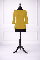 Stock photo of our Nuggles® Essential 3/4 Tee in Mustard