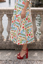 Model wearing Nuggles® Gracie Dress in Garden Stripe