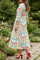 Model wearing Nuggles® Gracie Dress in Garden Stripe